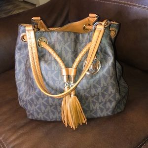 Dark brown, and light brown Michael Kors purse
